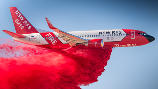 Large Air Tanker releasing retardant